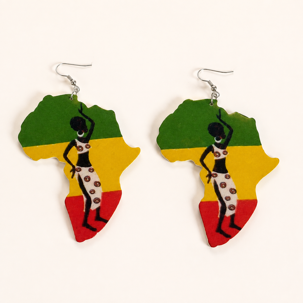 Pair of Africa-shaped wooden earrings painted green, yellow and red with a silhouette design.