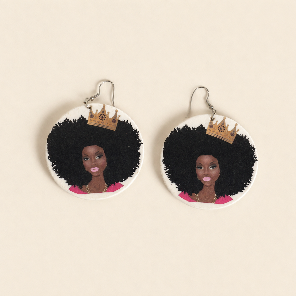 Crowned Afro wooden drop earrings with a painted portrait and metal hooks, shown as a pair.