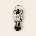 Hand-painted wooden zebra-head keyring with a metal split ring.